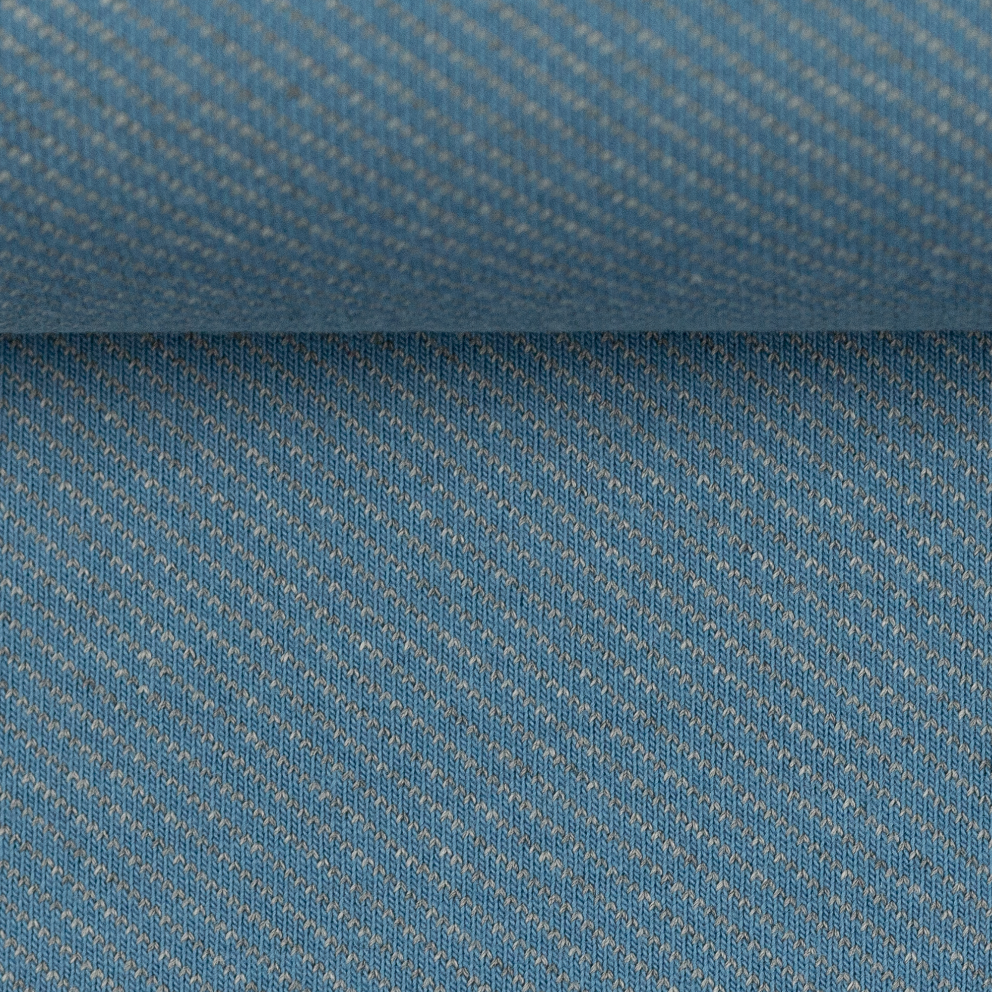 Licht rekbare blauwe jacquard in katoen / polyester