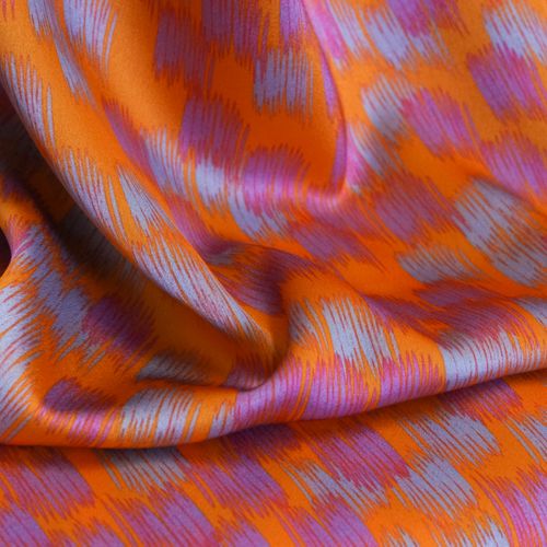Gesatineerde rekbare polyester oranje met paars en blauw patroon