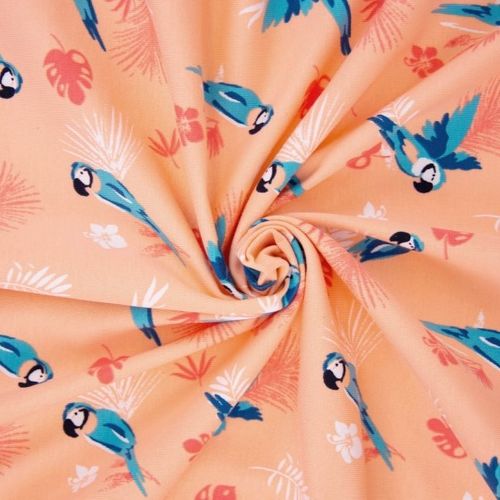 Tricot zacht oranje met papegaaien   - Katia Fabrics