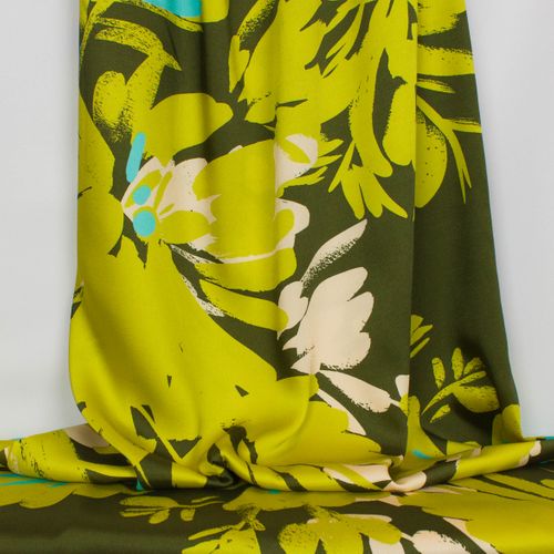Polyester satijn limoen groen met abstracte print - Knipmode & Editex