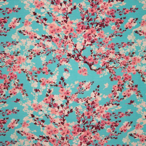 Turquoise tricot met bloemenprint