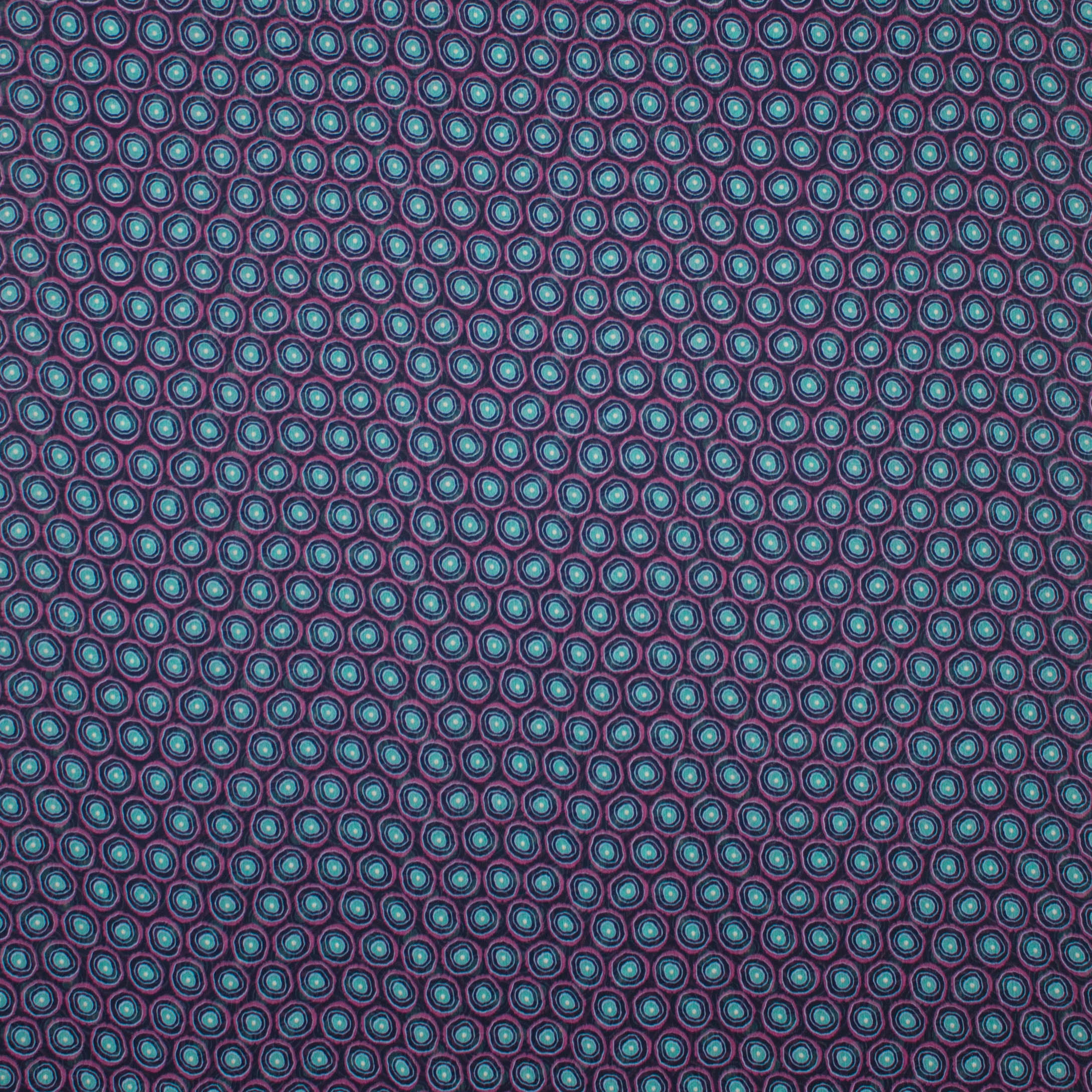 Fijne polyester met bollen motief in paars en blauw