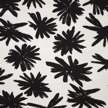 Ecru viscose tricot met zwarte bloemen