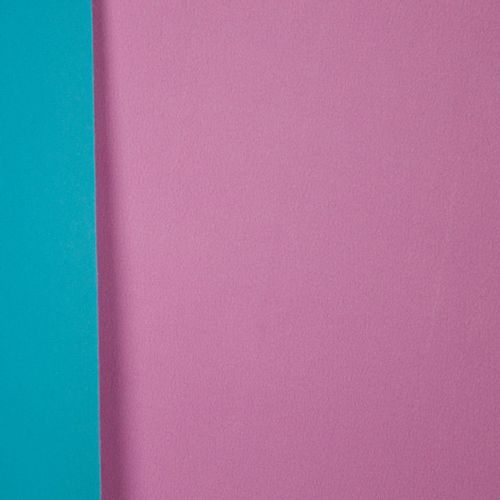 Turquoise softshell met roze achterkant