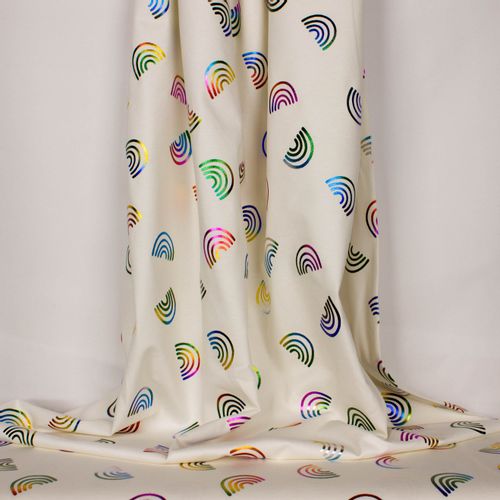 Witte tricot met glinsterende regenboogjes