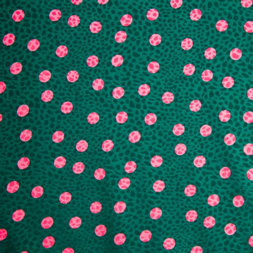 Groene gesatineerde polyester jacquard stretch met roze stippen