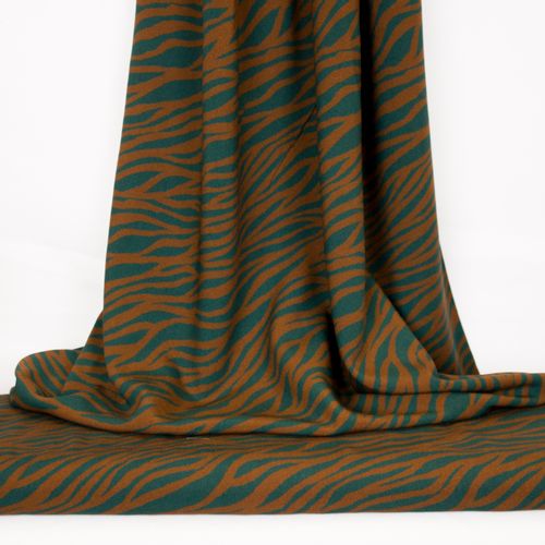 Groene viscose met donker oranje zebra-strepen