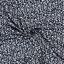 Zwarte viscose tricot met geometrisch patroon zwart-wit