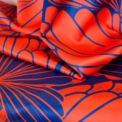 Polyester met oranje en blauw bloemenmotief van Fibre Mood