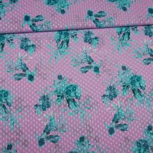 Lila polyester voile met turquoise bloemen van Knipmode