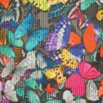Tricot met breisteekmotief en vlinders