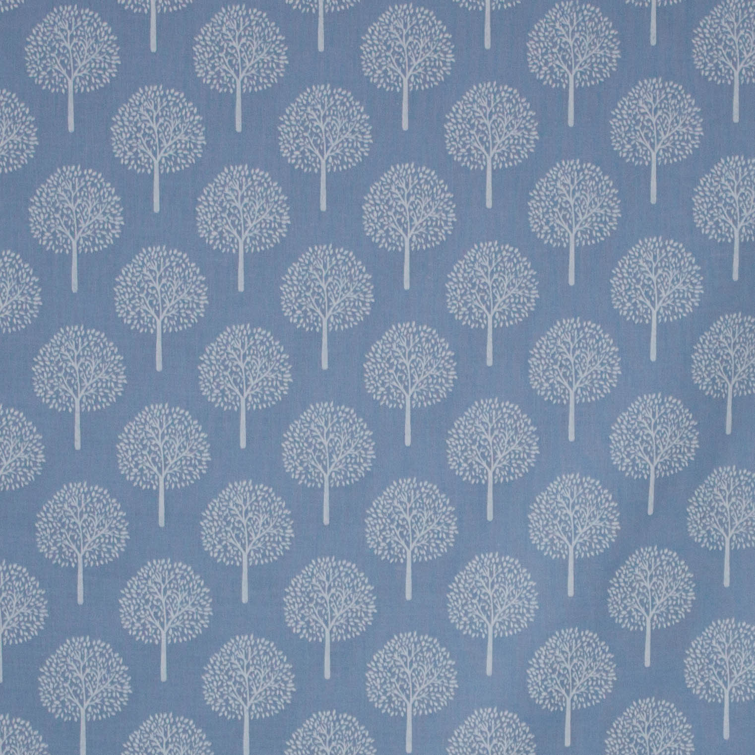Katoen blauw met witte bomen
