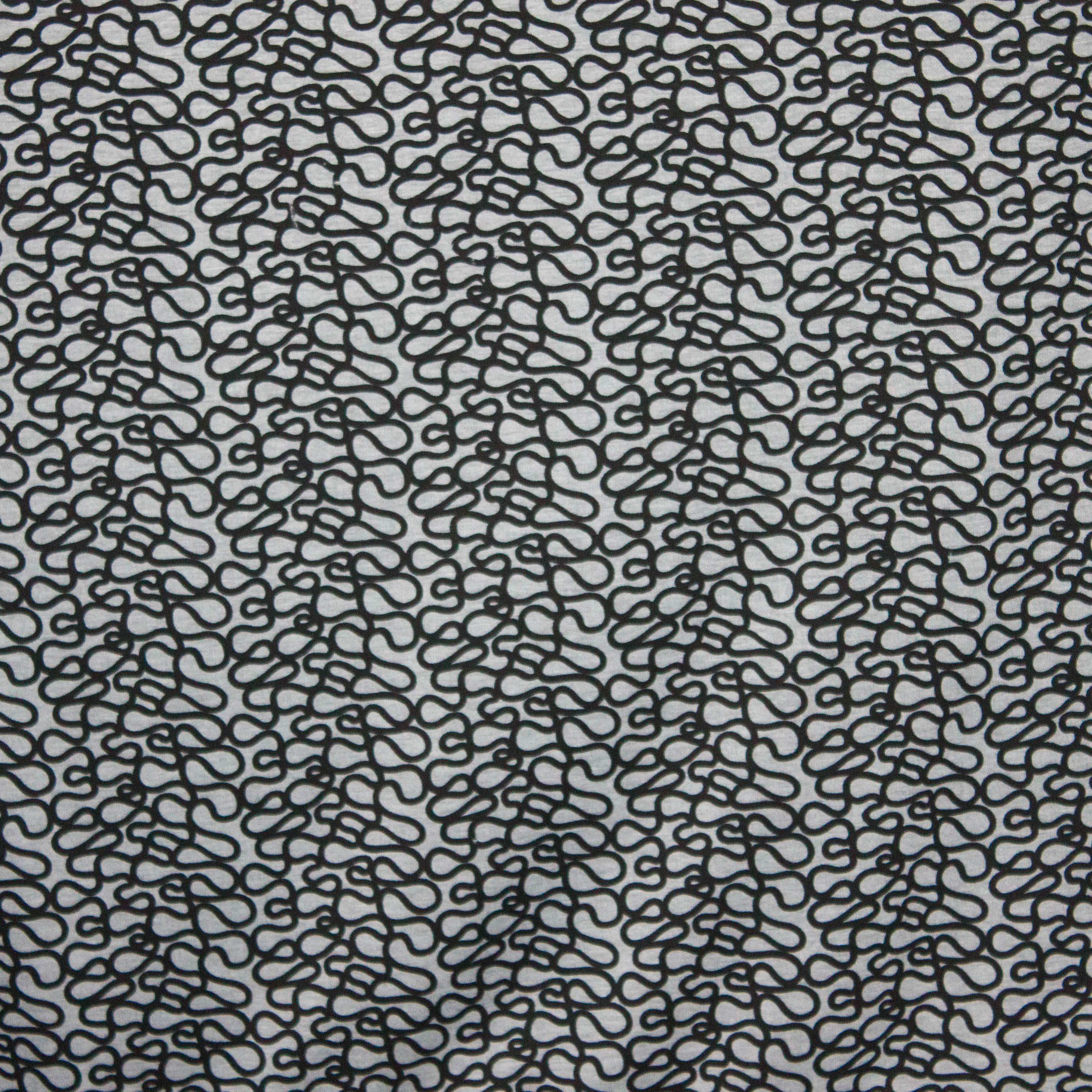 tricot grijs met zwarte krullen