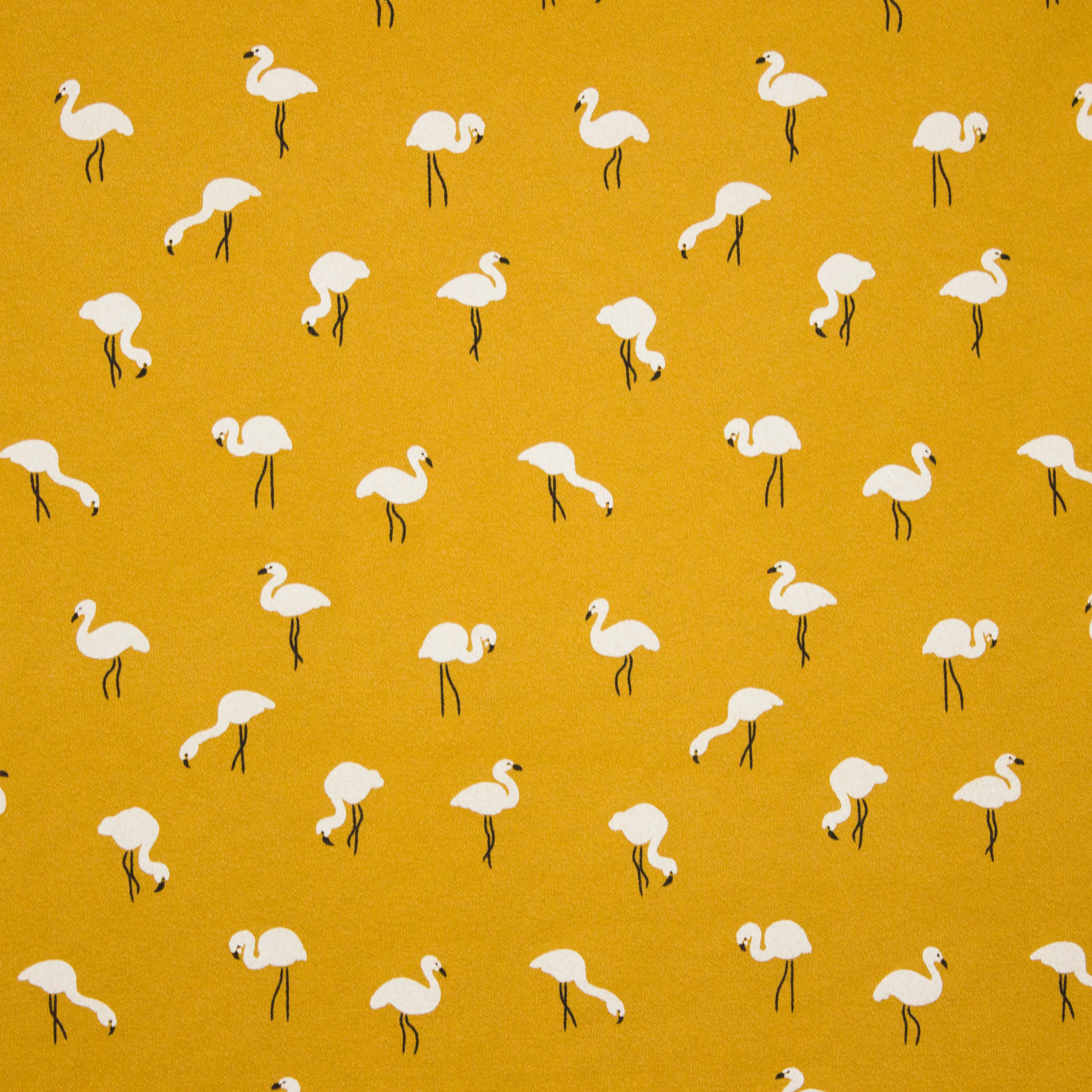 Crêpe tricot met flamingo motief op oker achtergrond