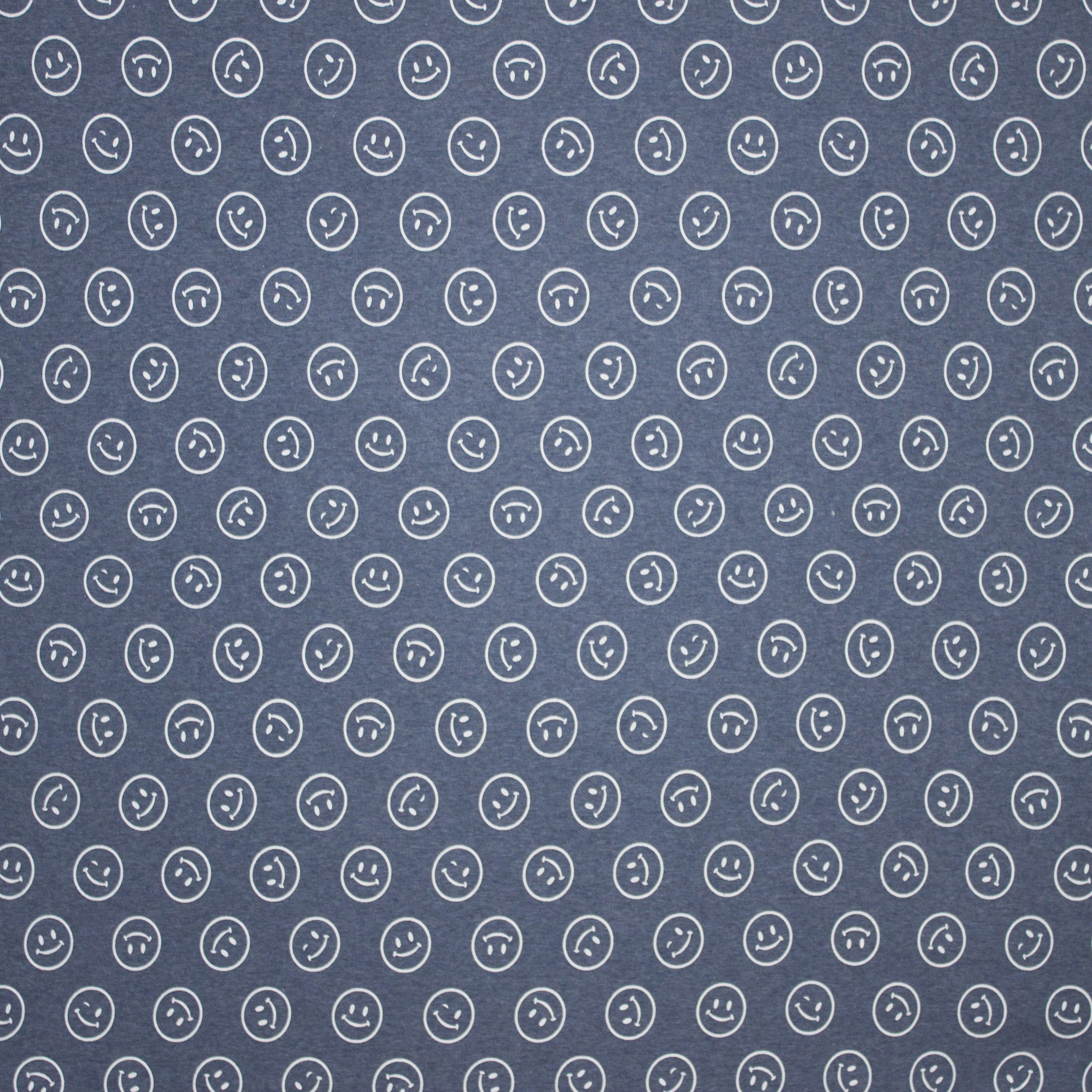 sweaterstof in jeansblauw met witte smileys