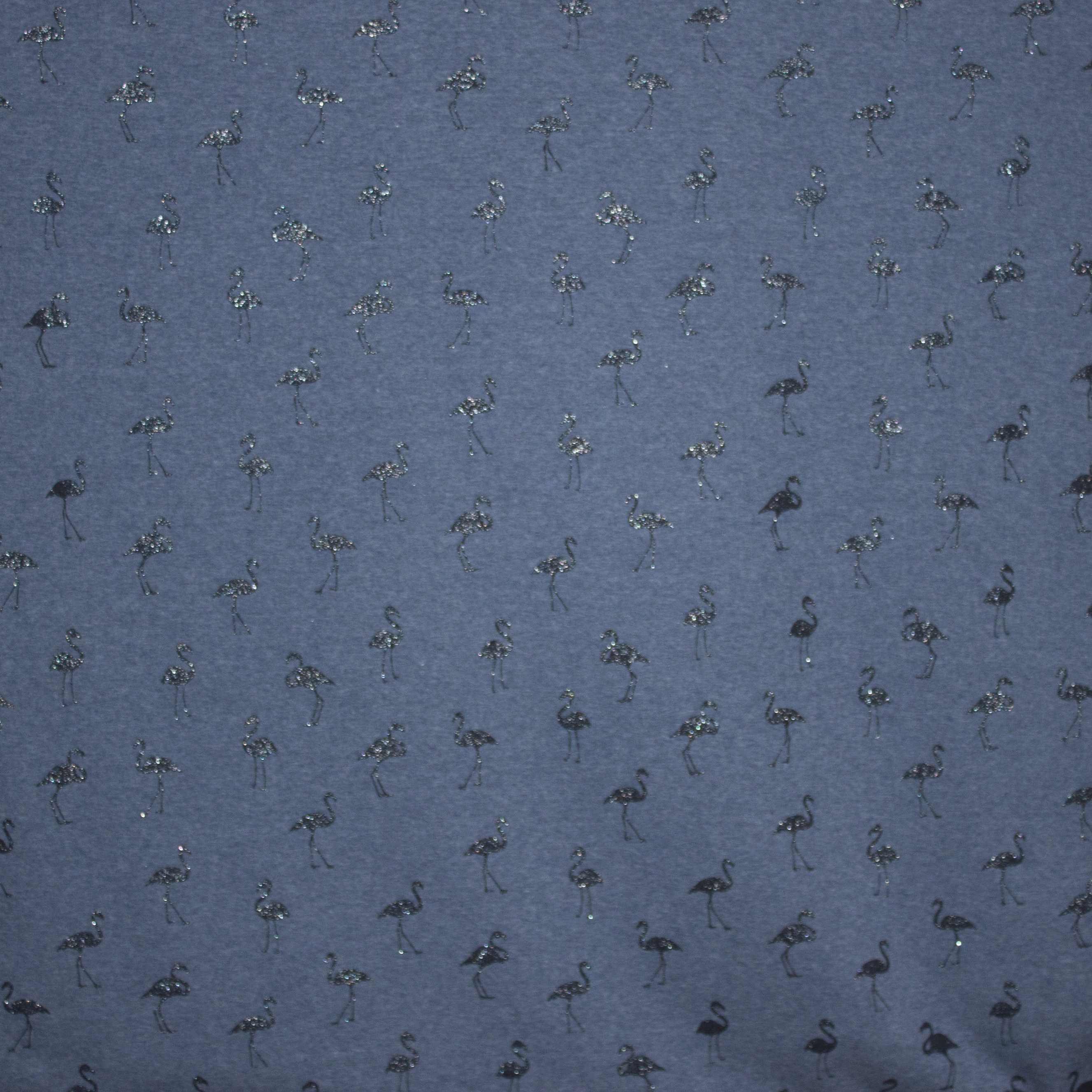 sweaterstof in jeansblauw met glitterflamingo