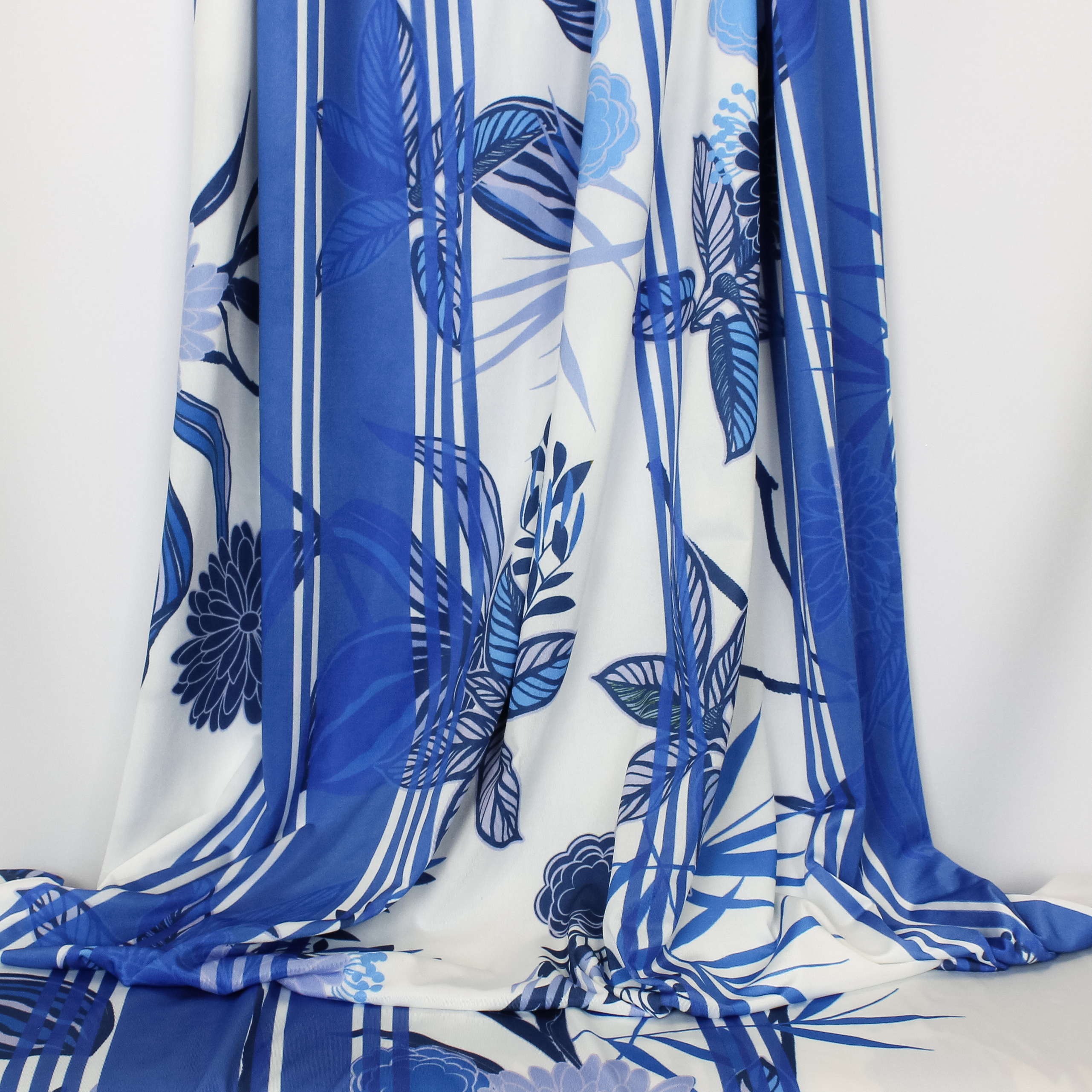 Rekbare soepele polyester lycra met bloemen en strepen