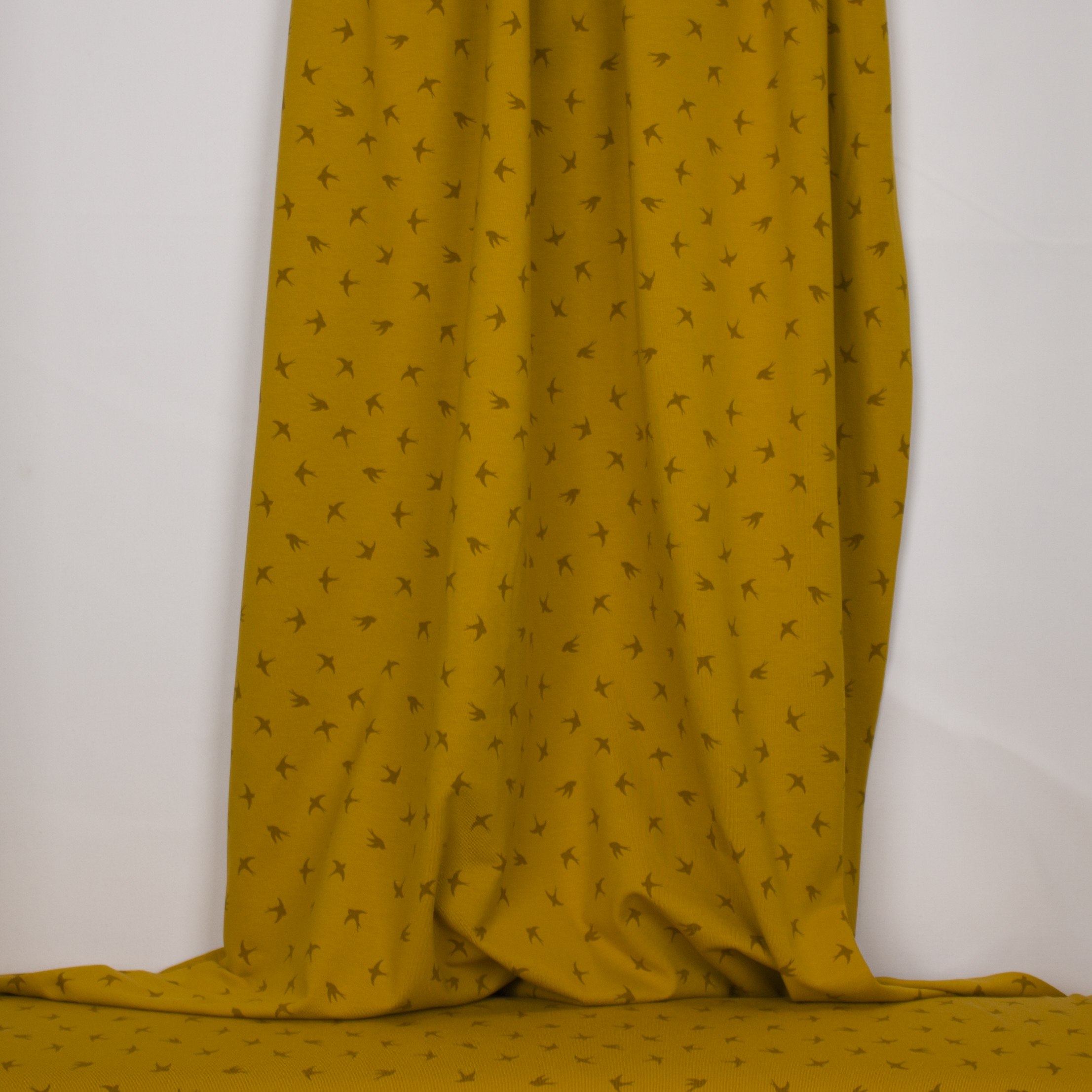 Okergele tricot met vogels