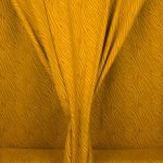 Okergele tricot met abstracte lijnen