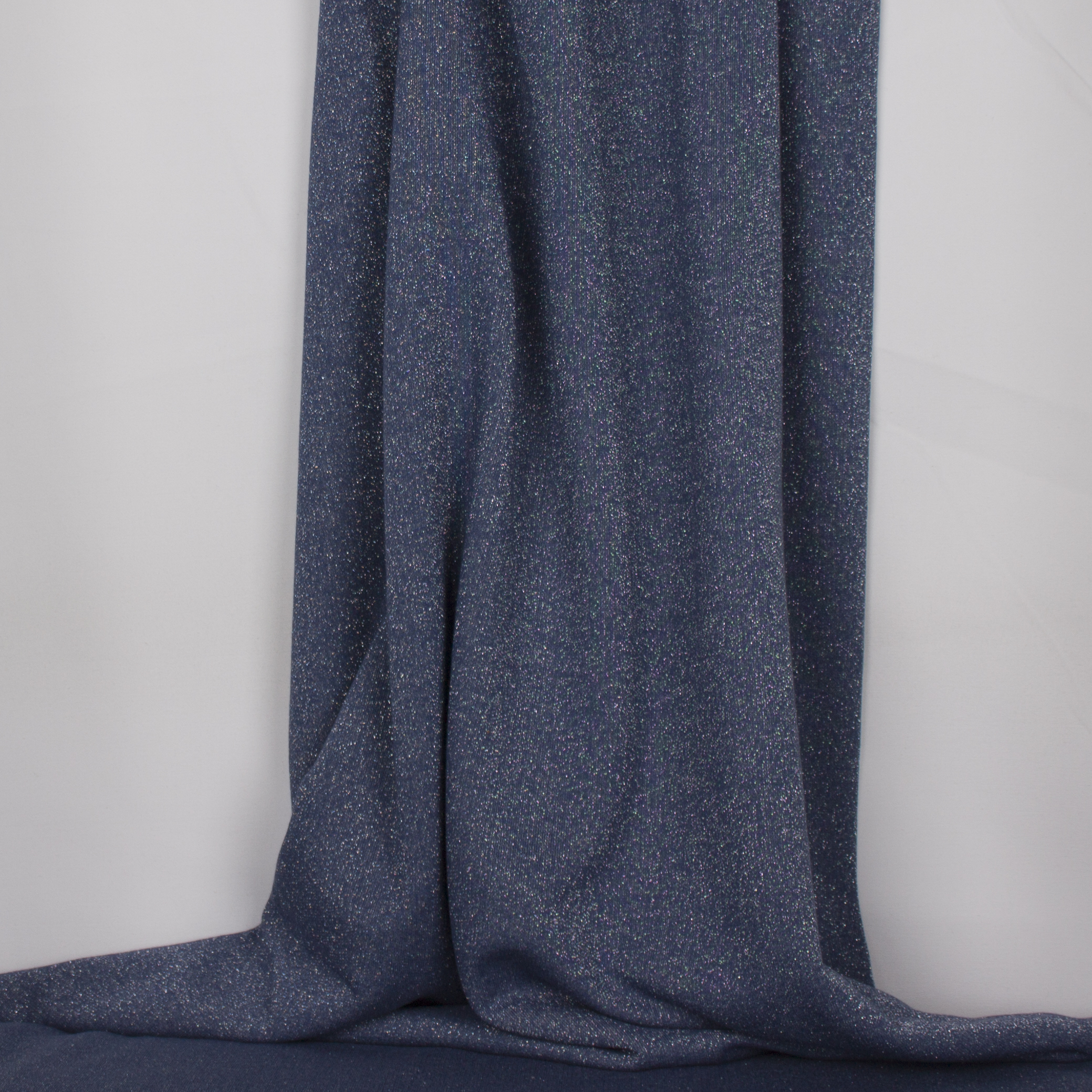 Blauwe sweaterstof met zilveren glitter