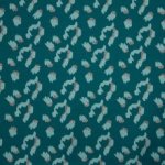 Turquoise metallic jersey met panterprint