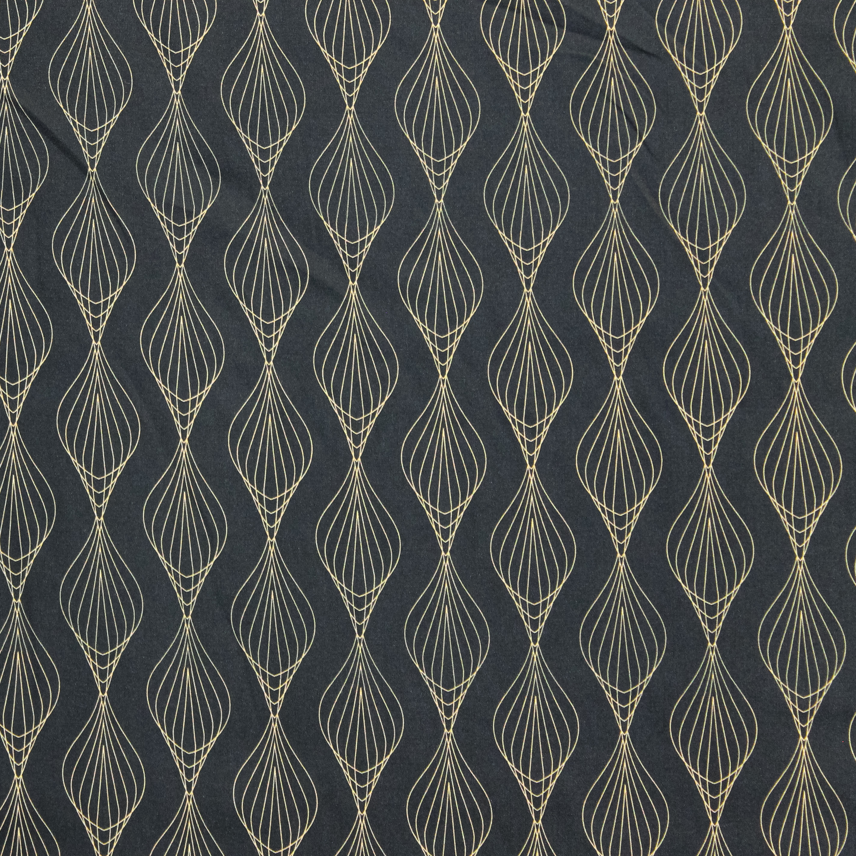 Polyester blauw met geometrisch motief - Knipmode