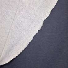 Blauwe sweaterstof in katoen / viscose mengeling met blauwe glitter