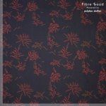 Zwarte rekbare katoen met rode en oranje streepjes uit 'Fibre Mood 17' Rika