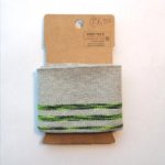 Grijze cuff (boordstof) met fluo geel/zwarte strepen