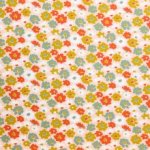 Roze katoentricot met bloemen van Poppy