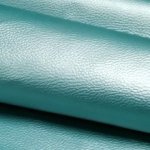 Turquoise glanzend imitatieleer (PU leer) met stoffen achterzijde