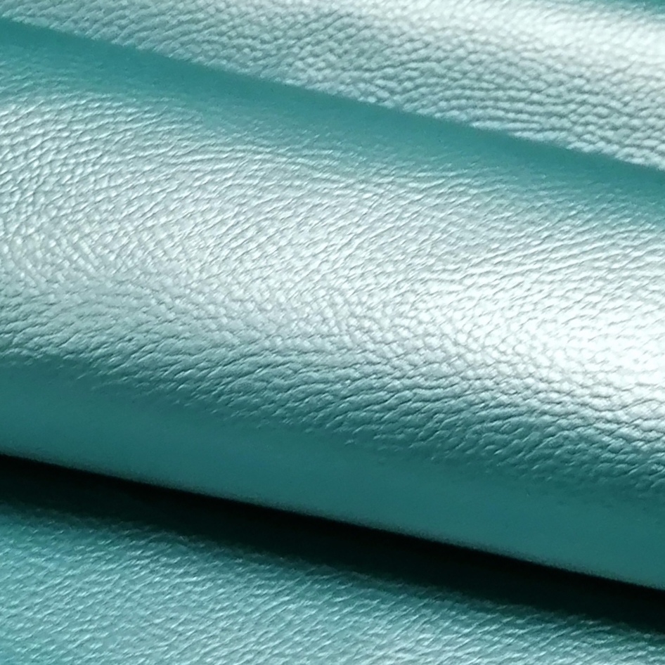 Turquoise glanzend imitatieleer (PU leer) met stoffen achterzijde