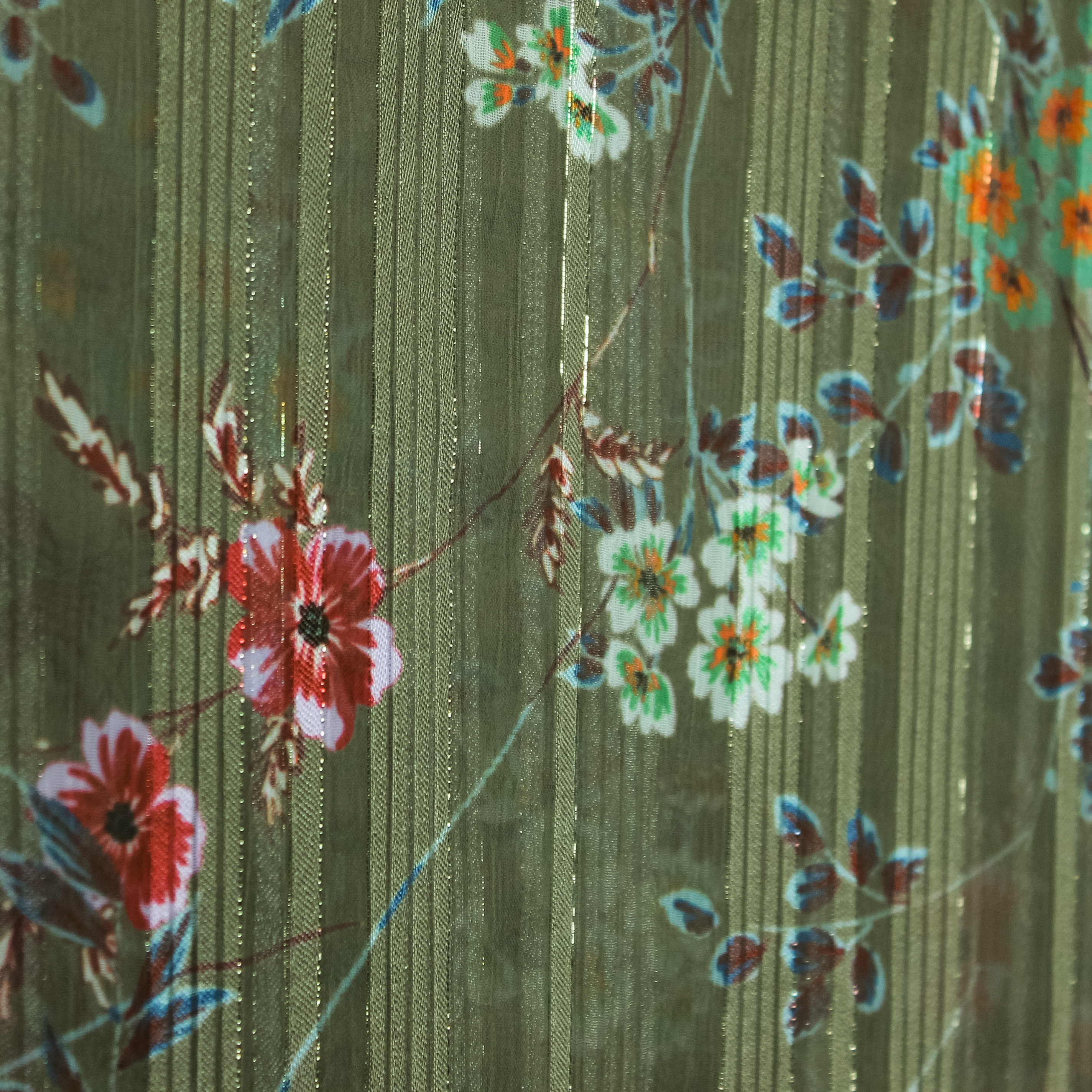 Lichte polyester groen met bloemen - glinsterend