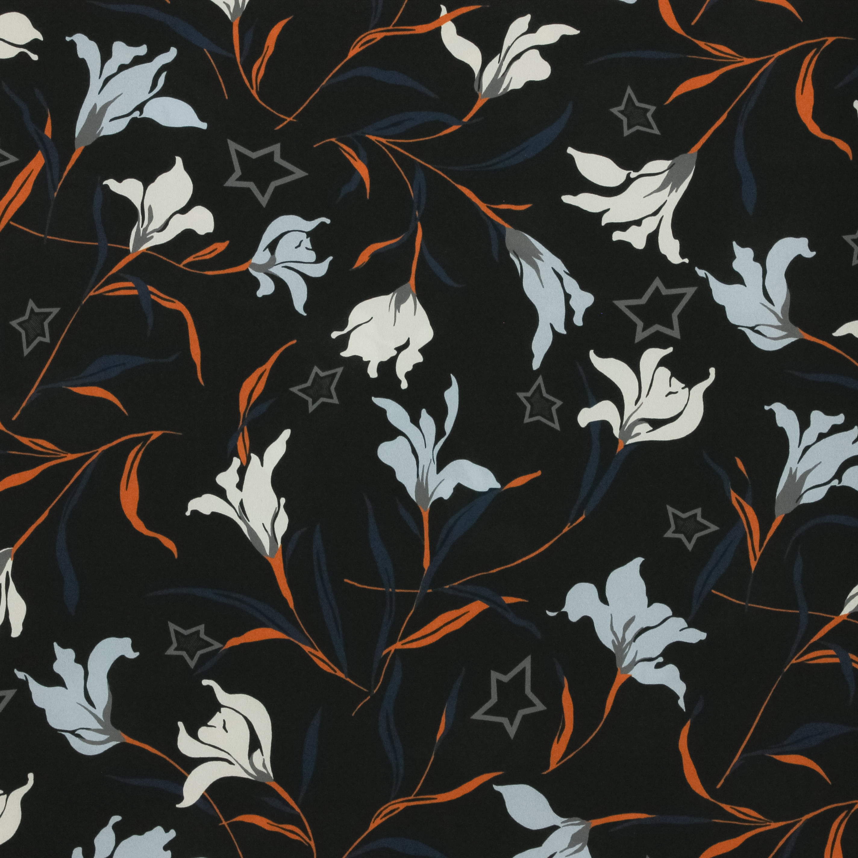 Lichte polyester crêpe zwart met bloemen en sterren