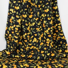Zwarte viscose crêpe met gele bloemetjes