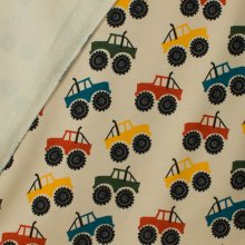 Gebrushte sweaterstof beige met tractoren