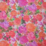 Jacquard katoenmengeling met fuchsia en oranje bloemen - A La Ville