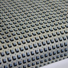Tricot jacquard blauw blokjes met glinstering