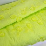 Broderie limoengroen met bloemen