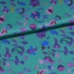 Gesatineerde polyester turquoise met bloemen