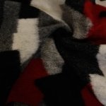 Wolmengeling met geometrisch patroon