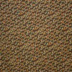 Polyester tricot met abstracte driehoekjes