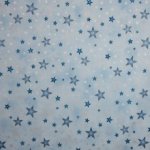 Lichtblauwe katoen met zilver en blauw ster motief