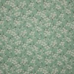 Lichtgroene french terry met witte bloemetjes