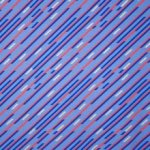 Blauwe tricot met schuine strepen in donkerblauw, zilveren glitter en oranje