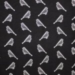 Zwarte viscosetricot met witte vogels