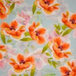 Lichtblauwe tricot met bloemenmotief
