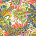 Soepele viscose tricot met pauwen en bloemen