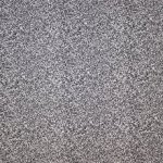 Tricot met zwart - witte vlekjes