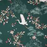Groene polyester met kraanvogels en bloemen